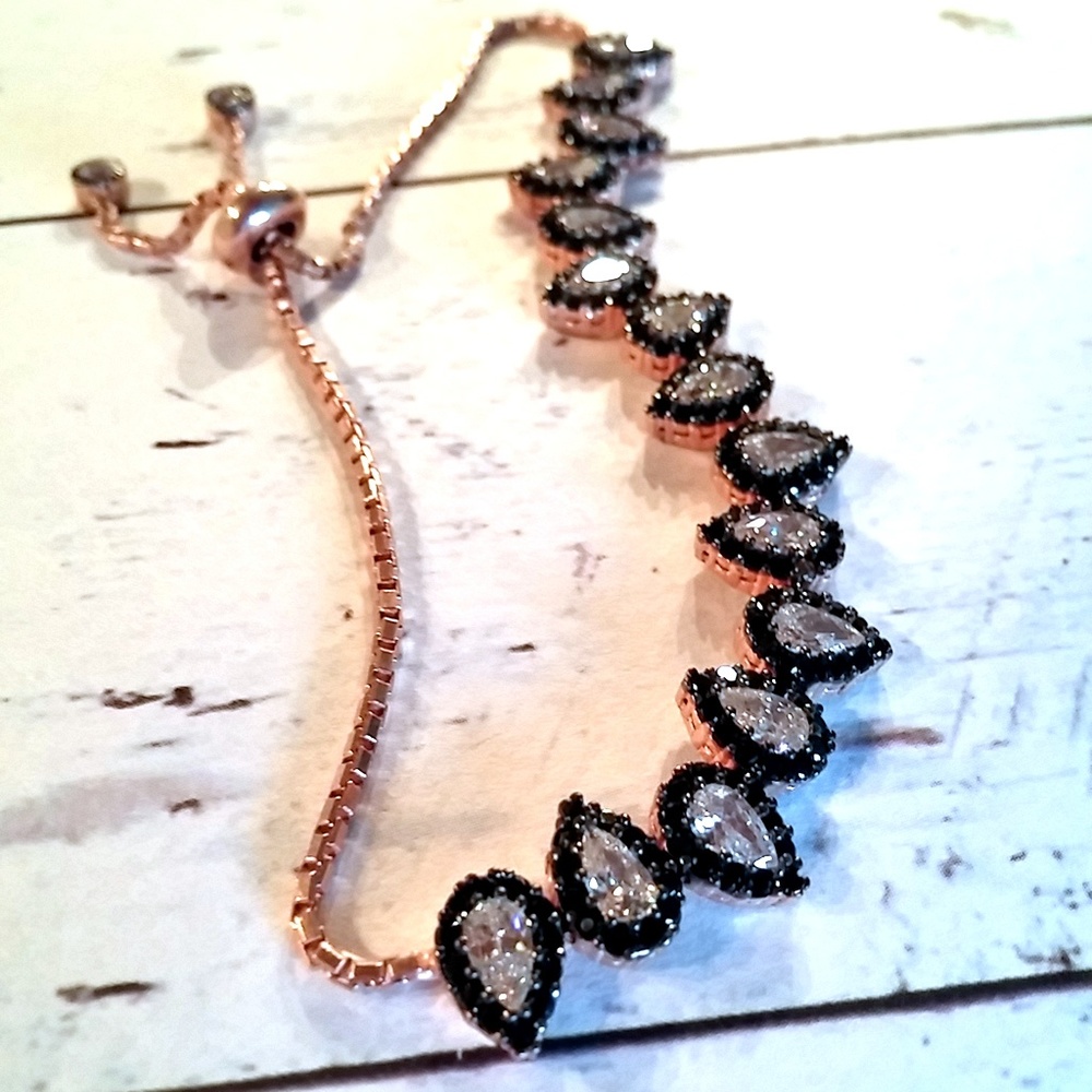 TENNIS BRACELET WITH AMAZING PEAR CUT CZ STONES